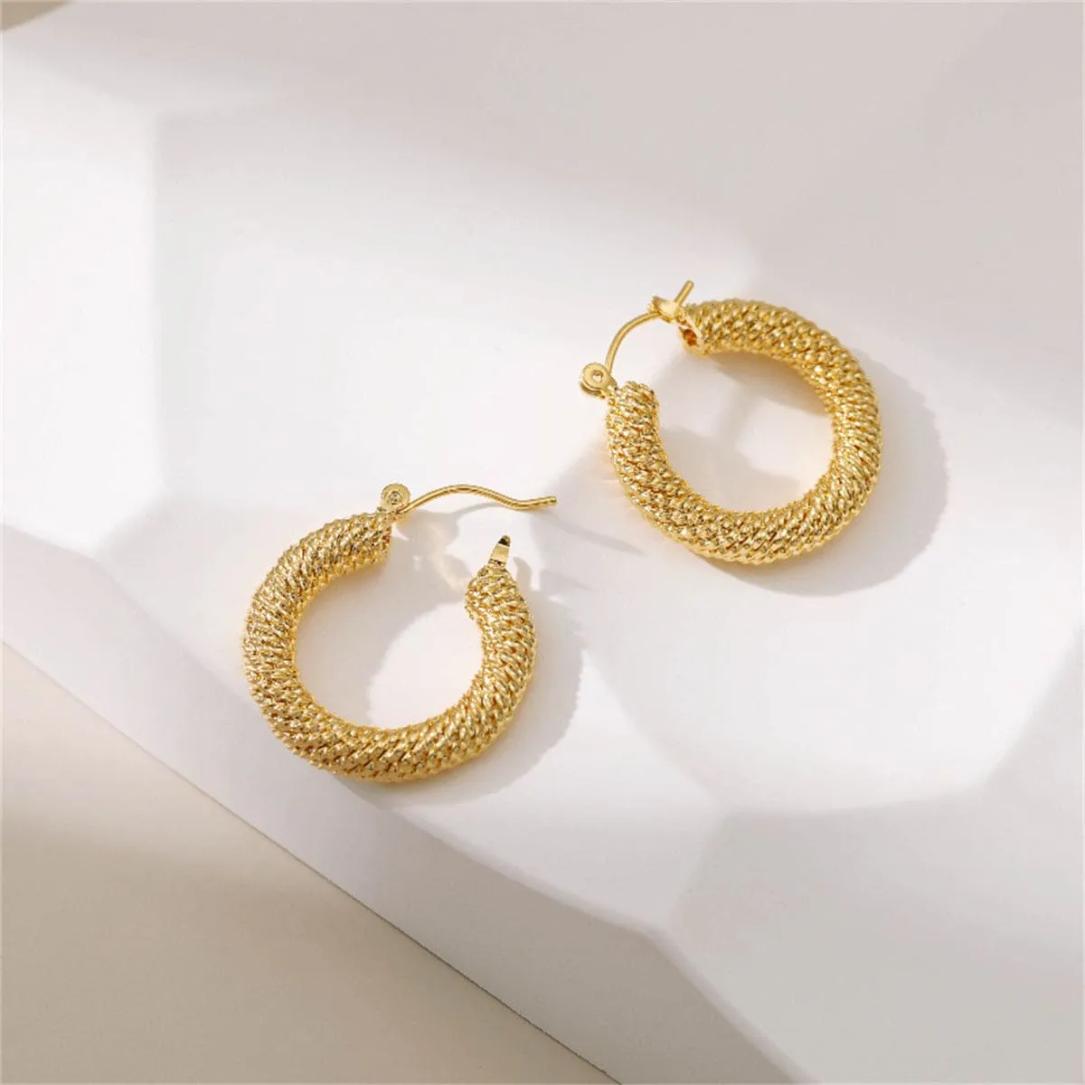 Goldtone Twisted Thread Hoop Earrings sold by Zulily product image thumbnail 3