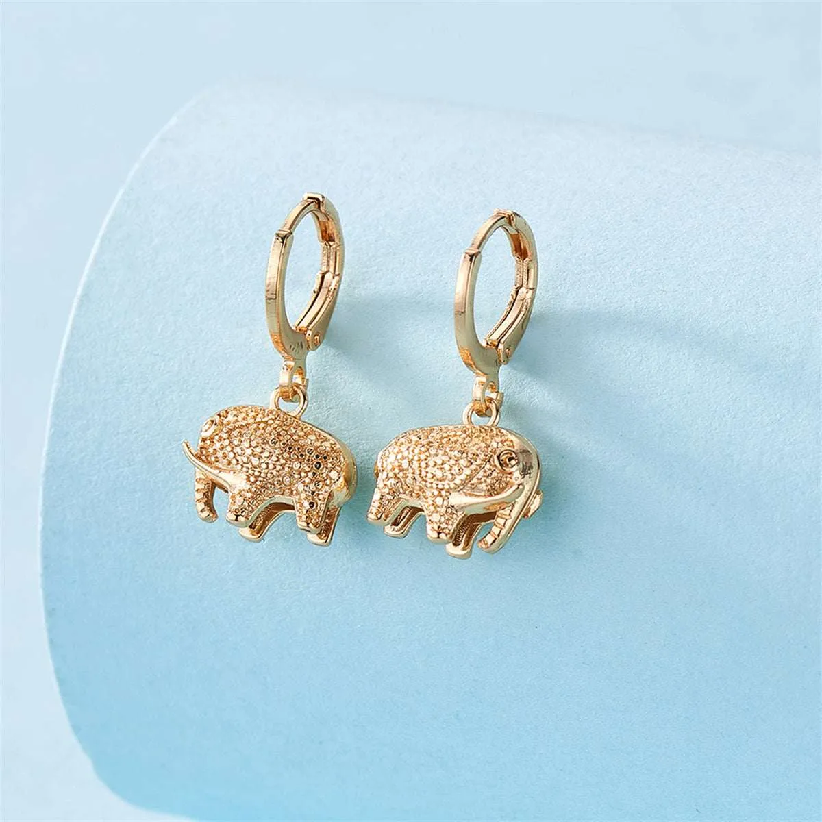 Goldtone Elephant Charm Huggie Earrings sold by Zulily product image thumbnail 2
