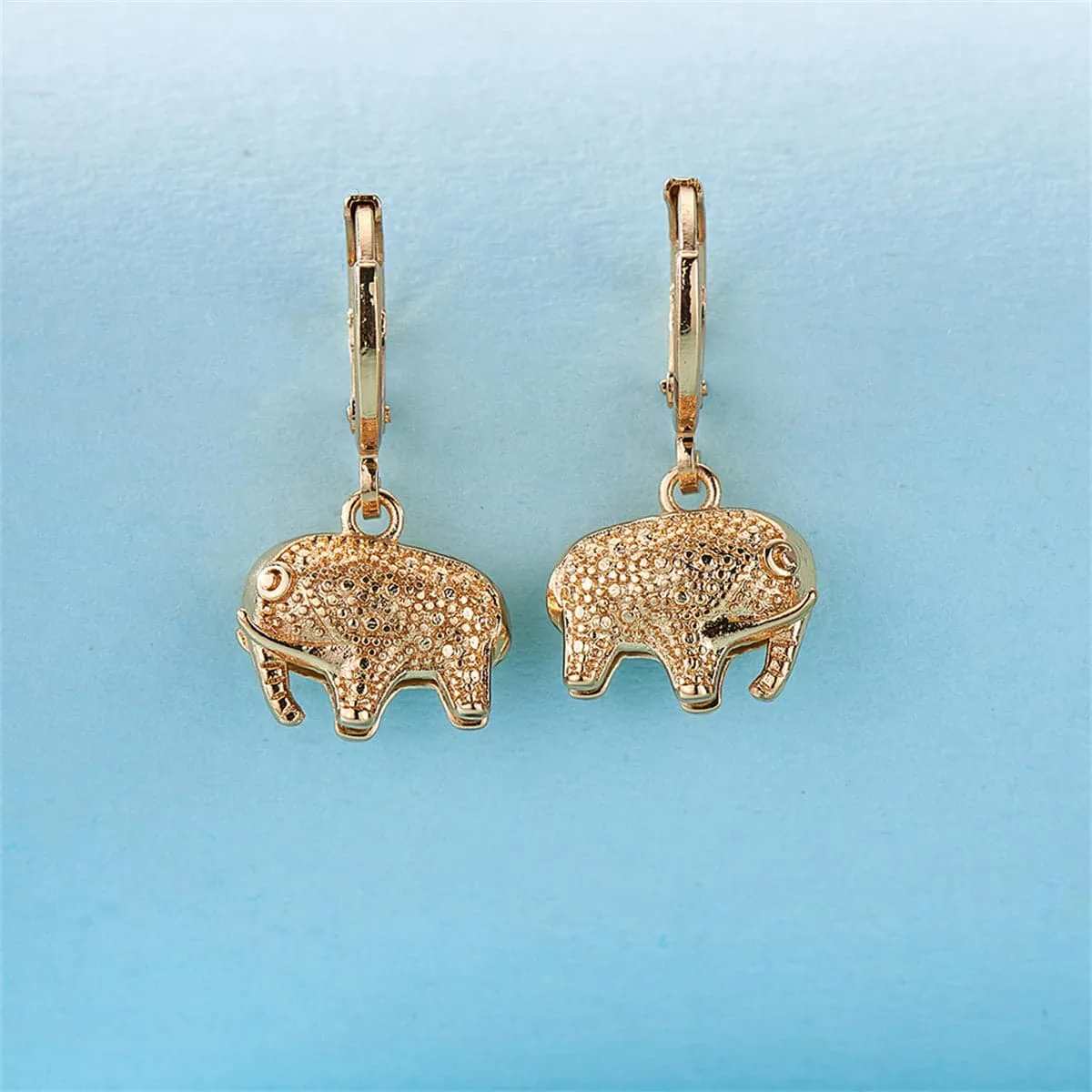 Goldtone Elephant Charm Huggie Earrings sold by Zulily product image thumbnail 3