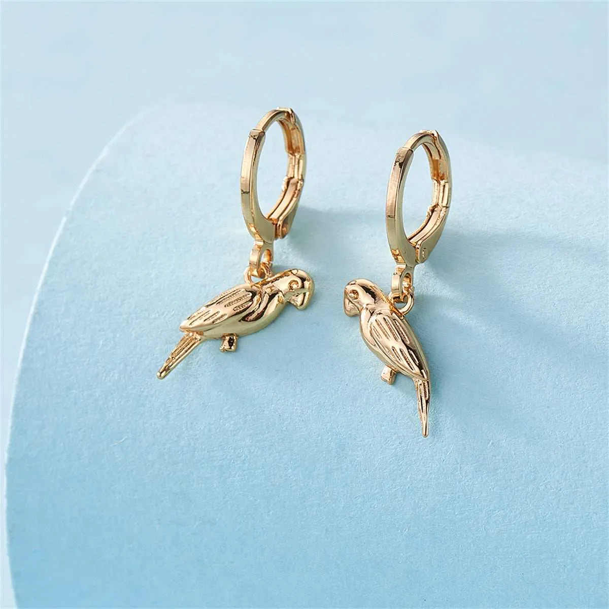 Goldtone Bird Huggie Earrings sold by Zulily product image thumbnail 2