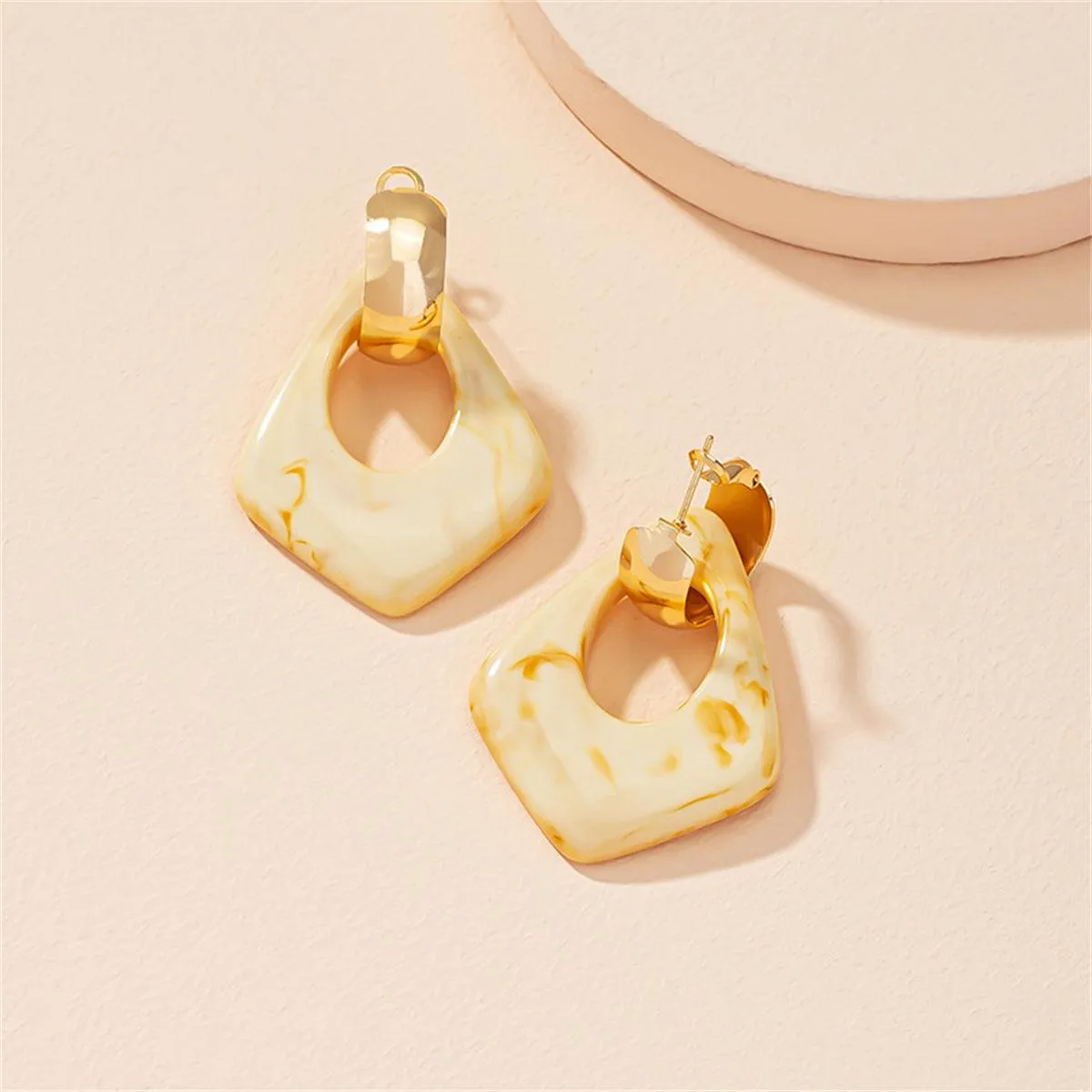 Cream Resin & Goldtone Chain Dangle Earring sold by Zulily