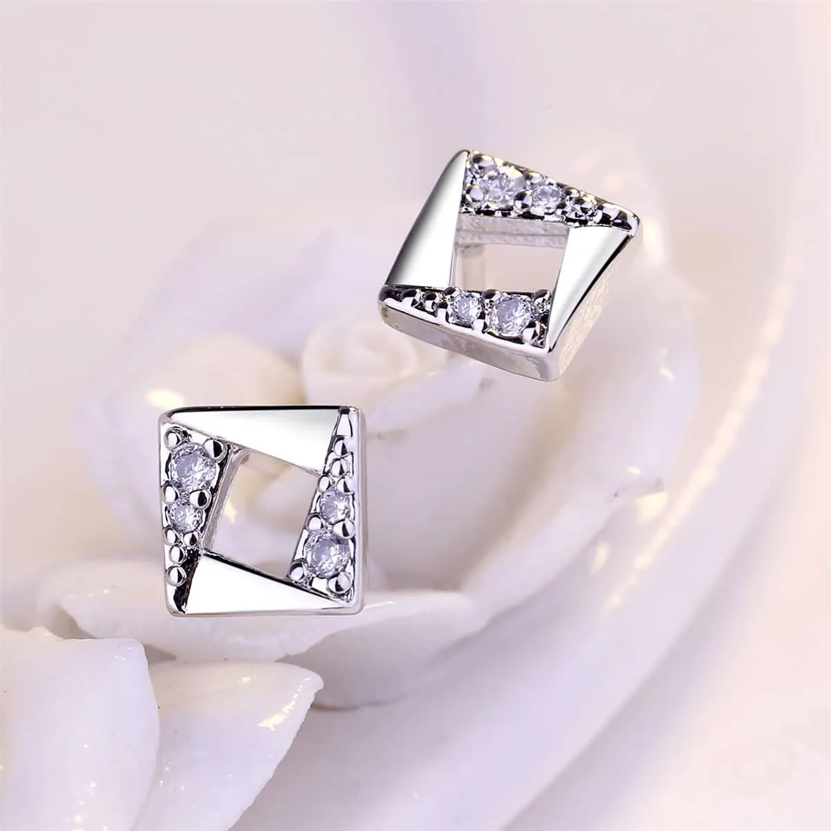 Cubic Zirconia & Silvertone Asymmetrical Rhombus Stud Earrings sold by Zulily product image thumbnail 2
