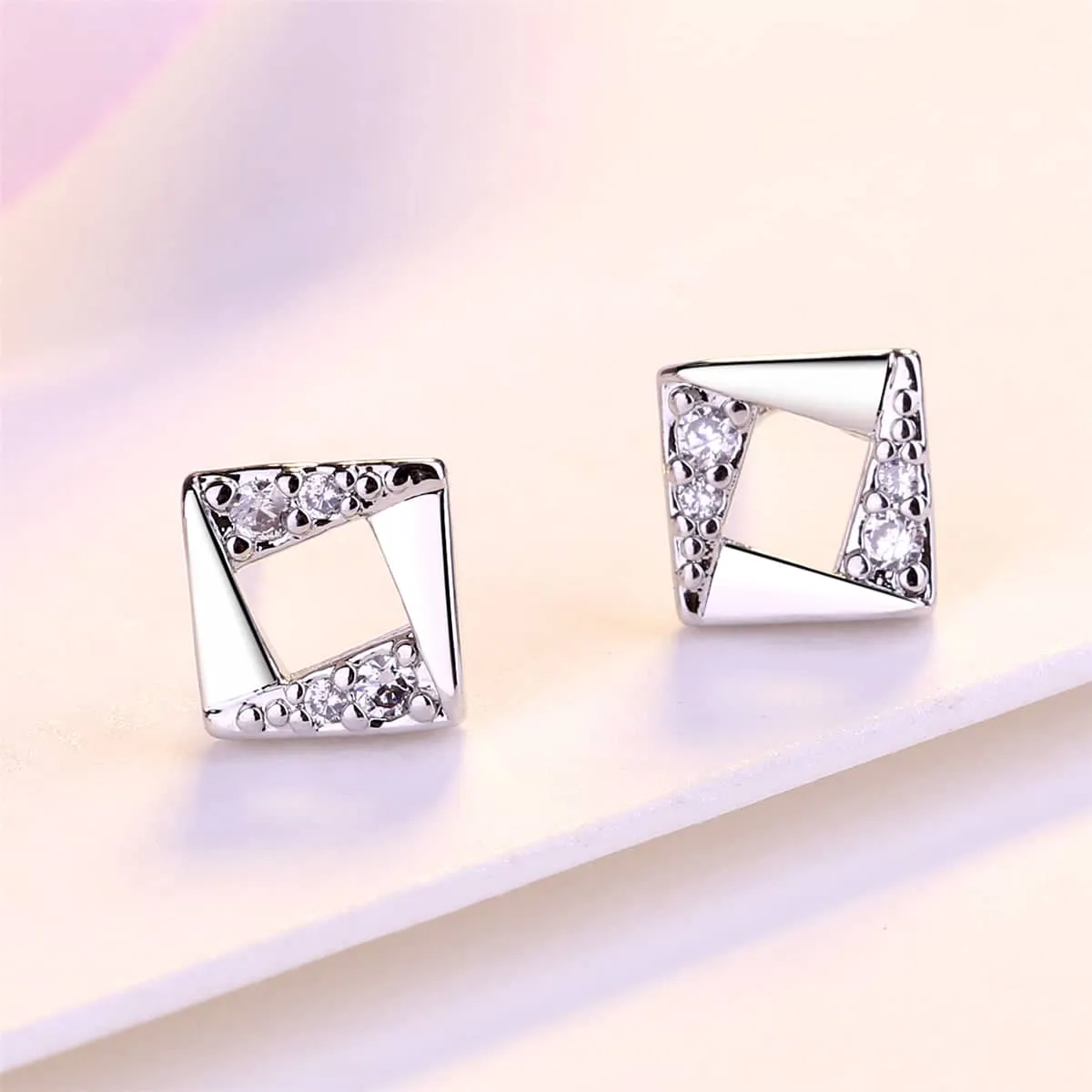 Cubic Zirconia & Silvertone Asymmetrical Rhombus Stud Earrings sold by Zulily product image thumbnail 3