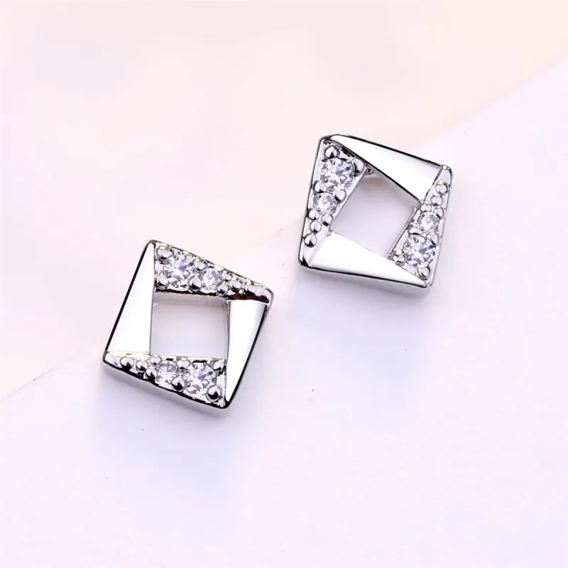 Cubic Zirconia & Silvertone Asymmetrical Rhombus Stud Earrings made by Zulily