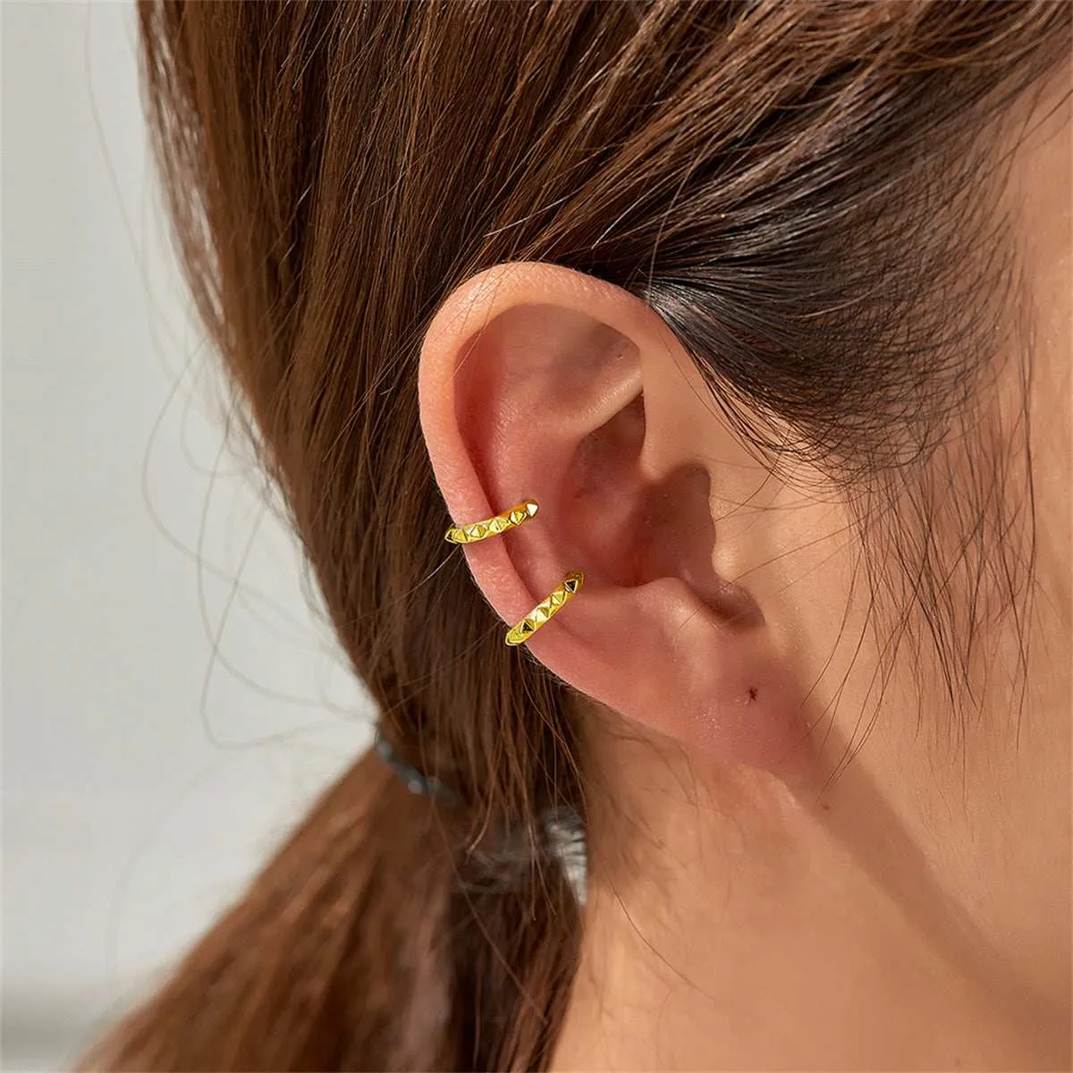 Goldtone Studded Ear Cuffs sold by Zulily