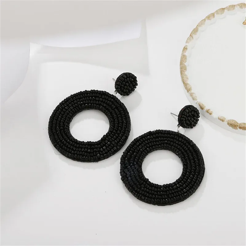 Black Howlite Beaded Open Circle Drop Earrings made by Zulily