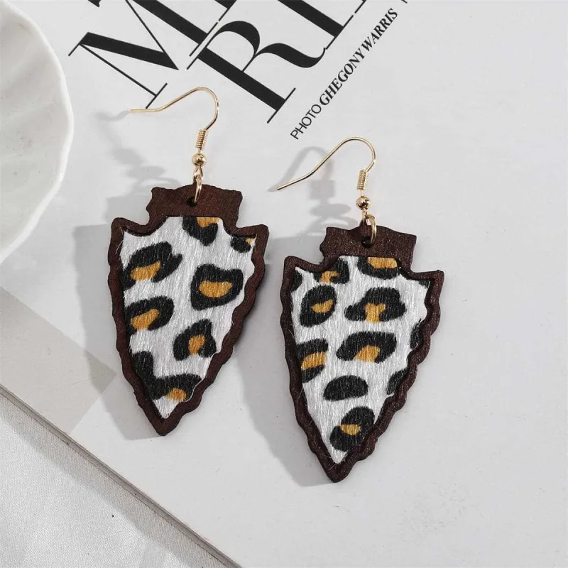 White Polystyrene & Wood Goldtone Leopard Arrowhead Drop Earrings made by Zulily