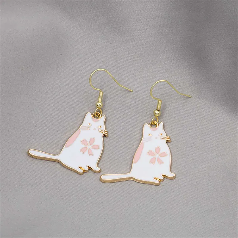 White Enamel & Goldtone Kitty Drop Earrings made by Zulily