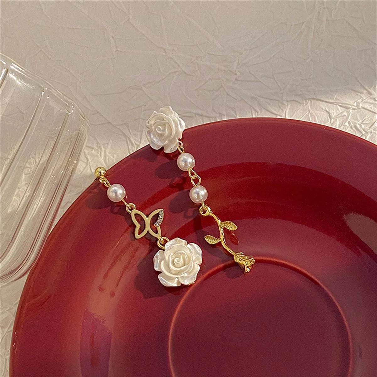 Pearl & Resin Goldtone Rose Butterfly Drop Earrings sold by Zulily