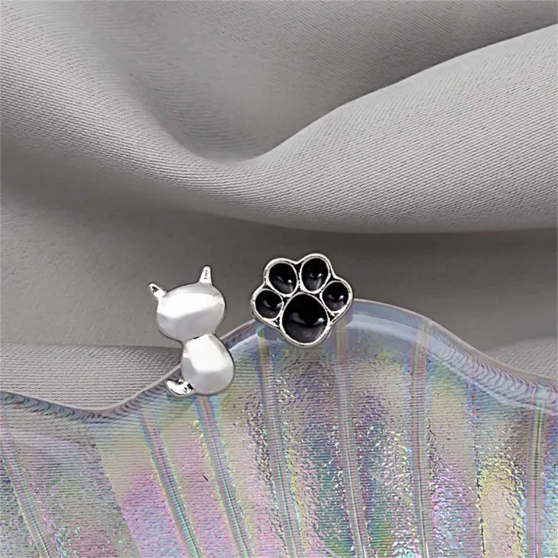 Black Enamel & Silvertone Kitty Paw Stud Earrings made by Zulily