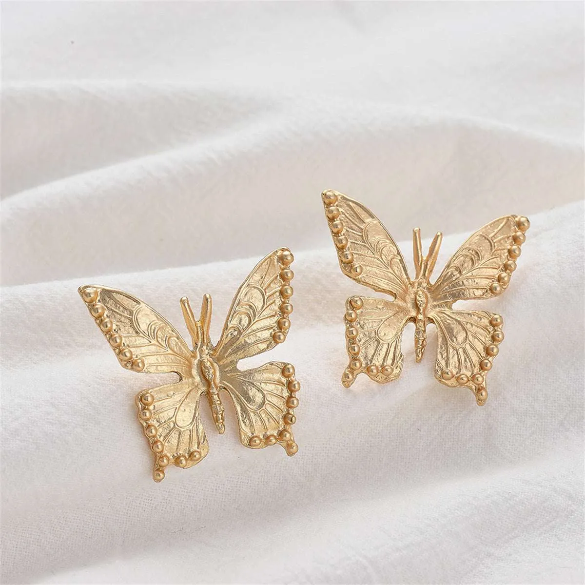 Goldtone Butterfly Stud Earrings sold by Zulily product image thumbnail 4