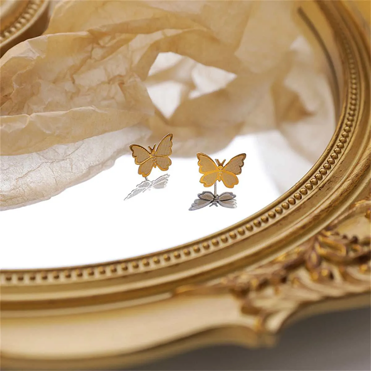 Goldtone Butterfly Stud Earrings sold by Zulily