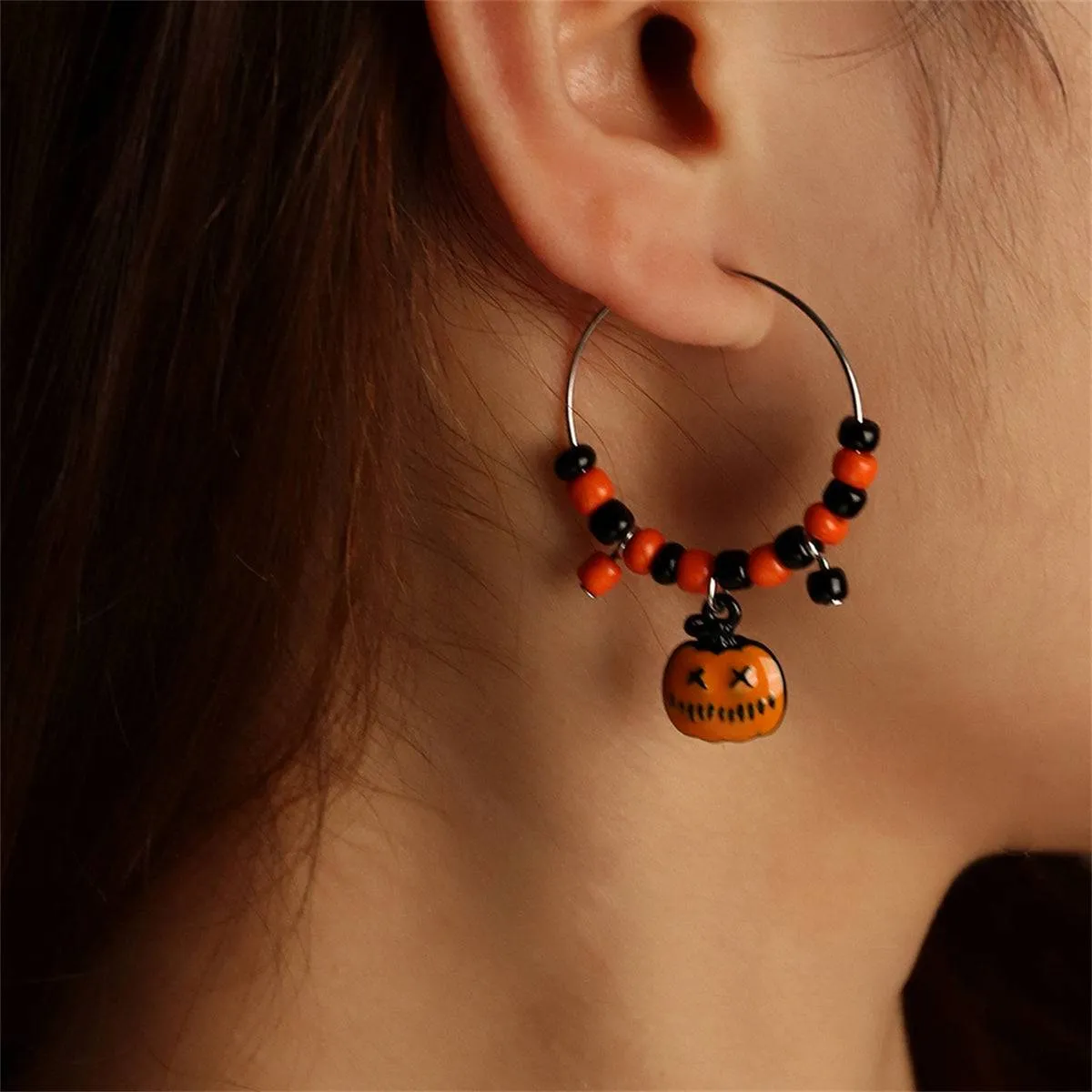 Orange Howlite & Silvertone Pumpkin Huggie Earrings sold by Zulily product image thumbnail 3