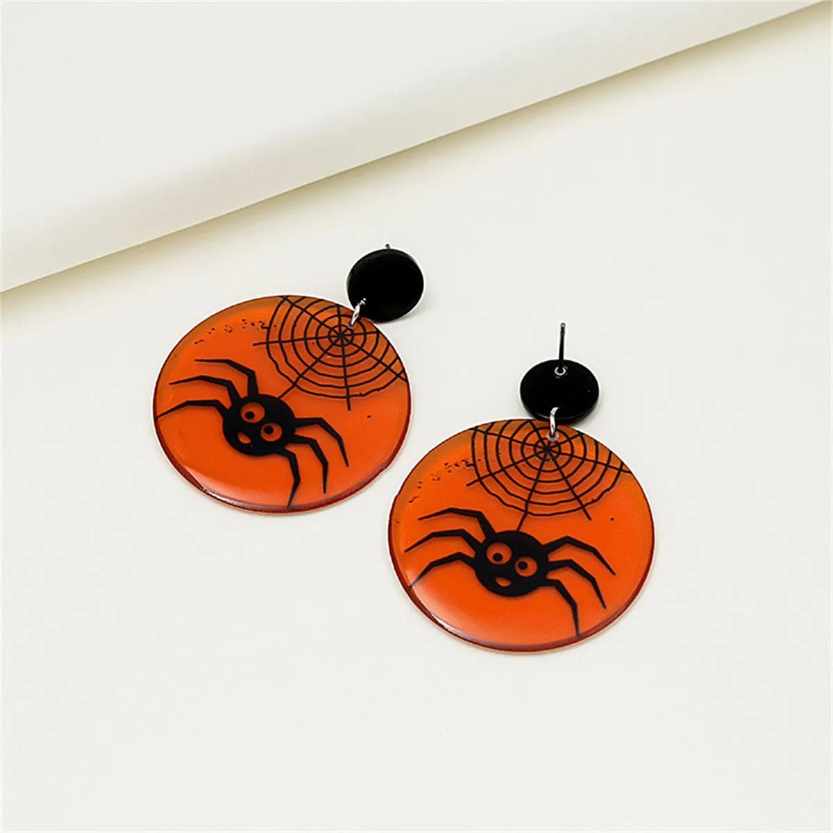 Black & Orange Spider Web Drop Earrings sold by Zulily