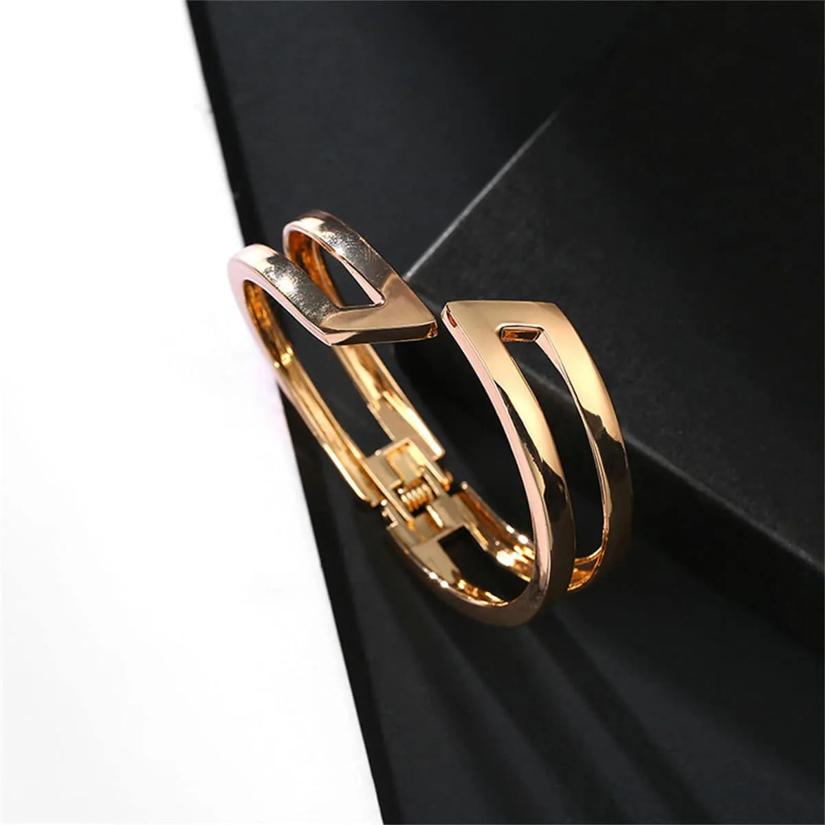 Goldtone Open Layered Bypass Bangle sold by Zulily product image thumbnail 3