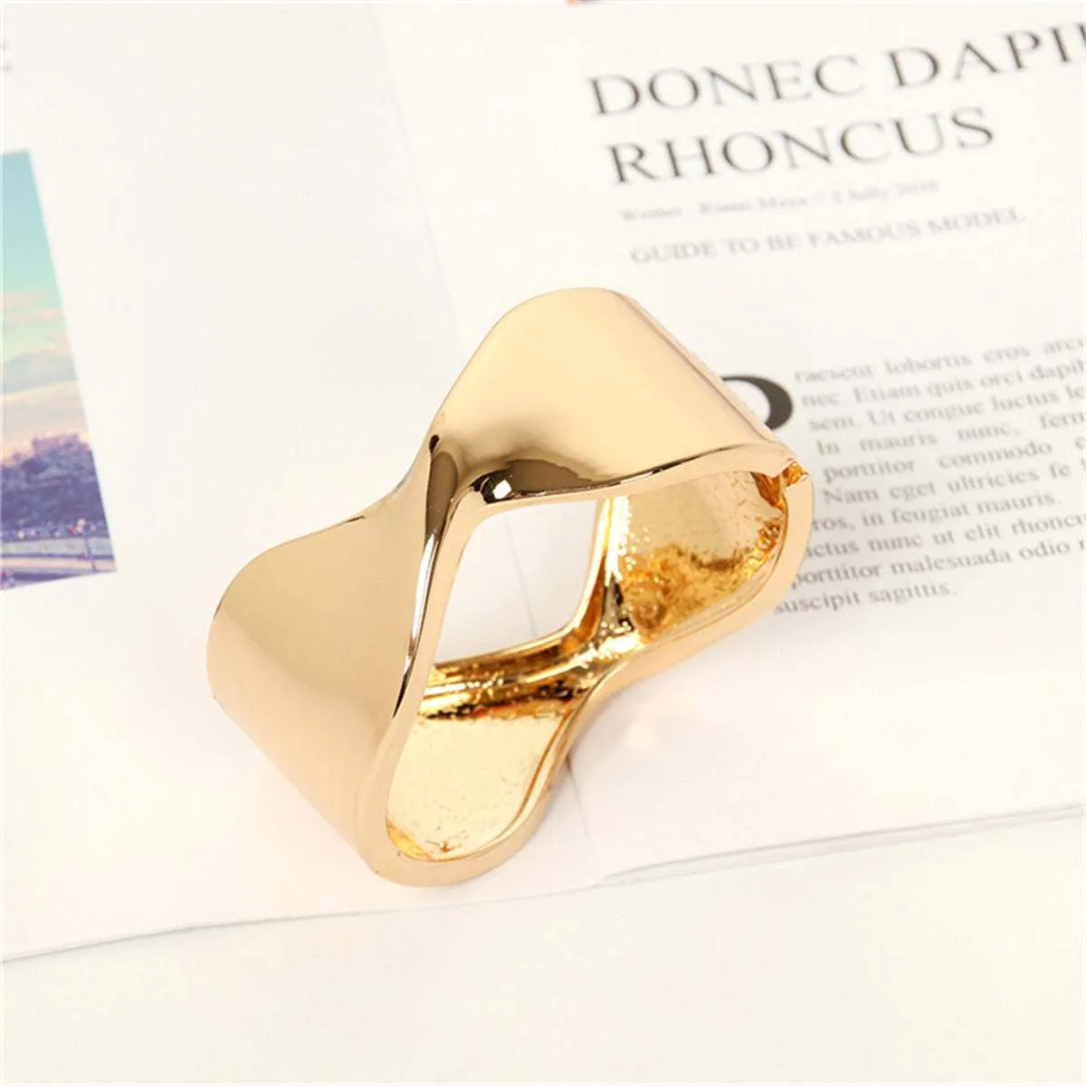 Goldtone Twisted Bangle sold by Zulily product image thumbnail 3