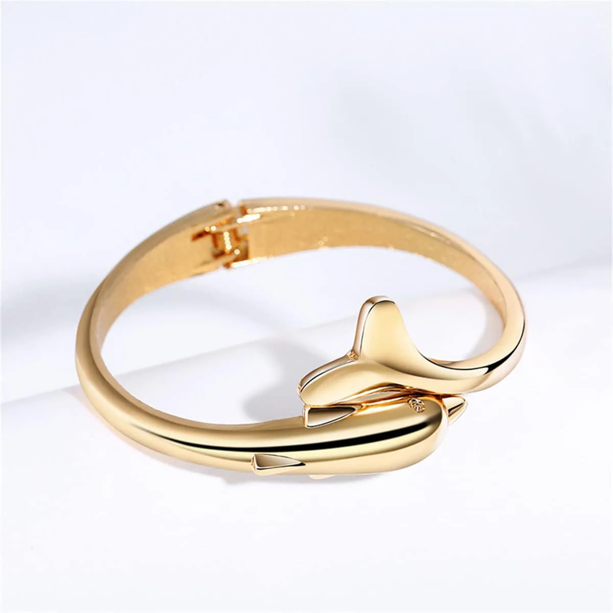 Goldtone Dolphin Hinged Bangle sold by Zulily product image thumbnail 2
