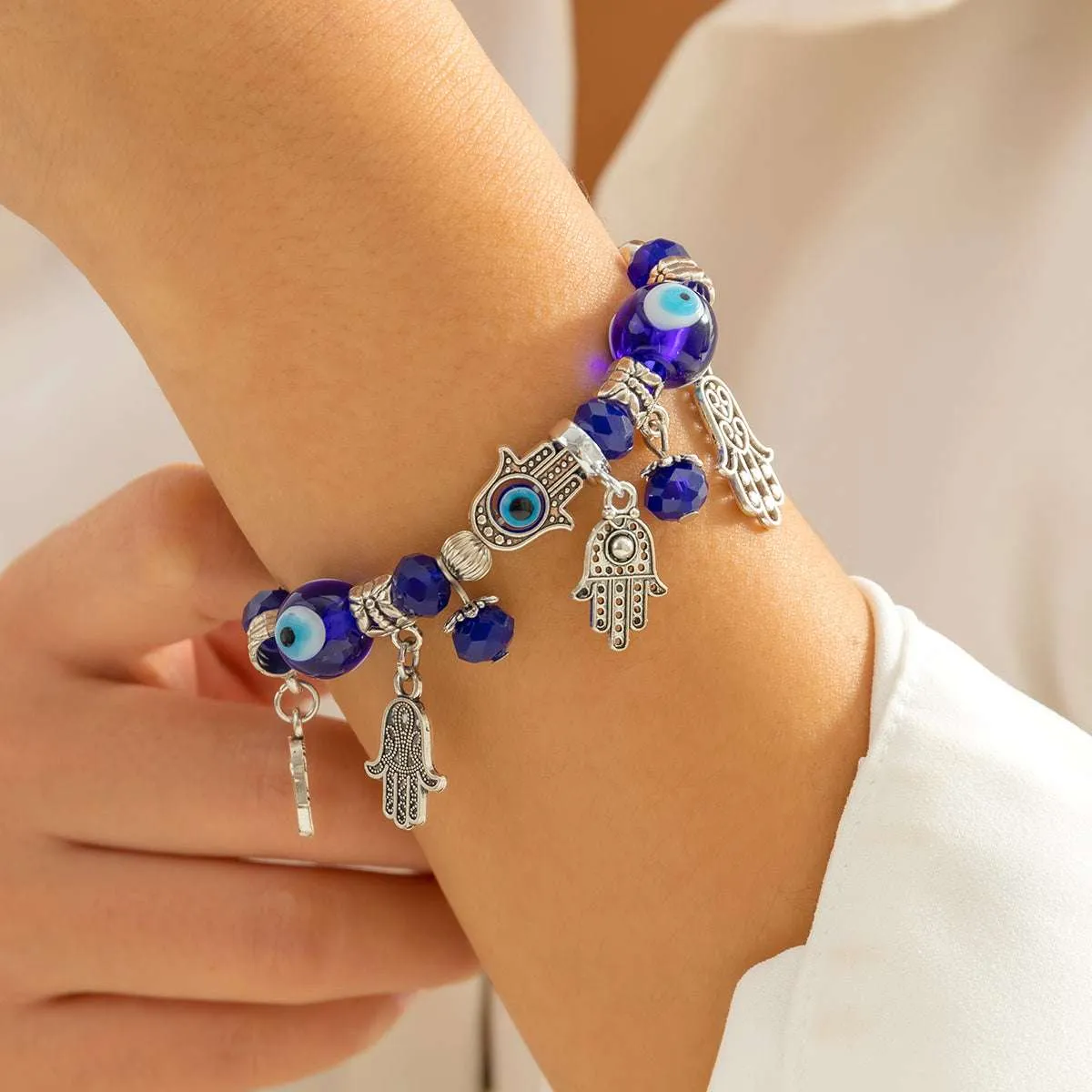Blue Acrylic & Silvertone Hamsa Stretch Bracelet sold by Zulily