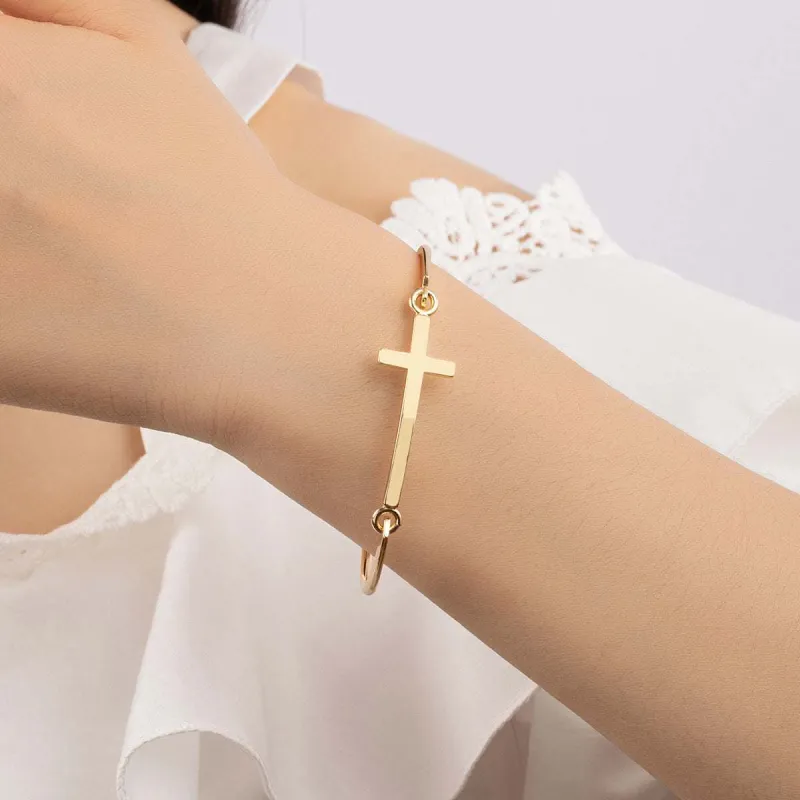 Goldtone Cross Bangle made by Zulily