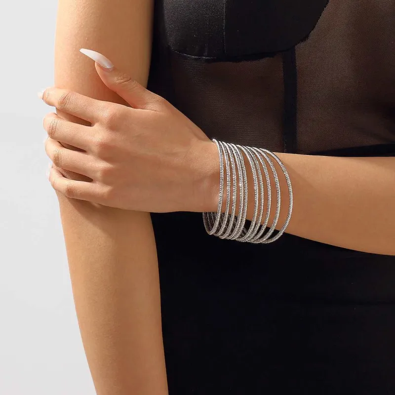 Silvertone Textured Bangle Set made by Zulily