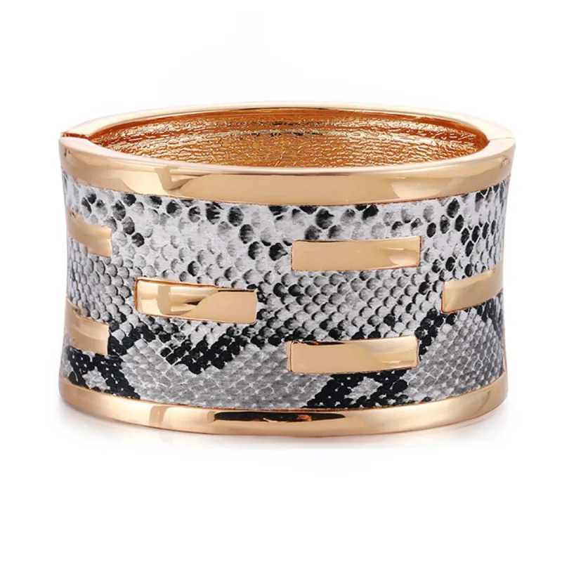 Polystyrene & Goldtone Serpentine Bangle made by Zulily