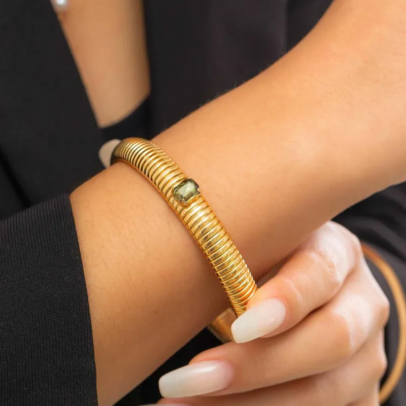 Green Crystal & Goldtone Herringbone Bangle made by Zulily