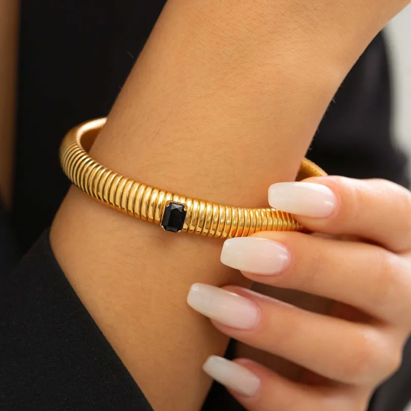 Black Crystal & Goldtone Herringbone Bangle made by Zulily