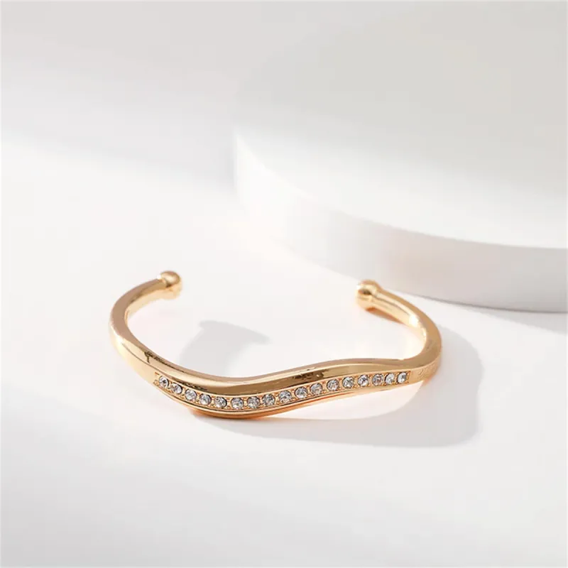 Clear Cubic Zirconia & Goldtone Wave Cuff made by Zulily