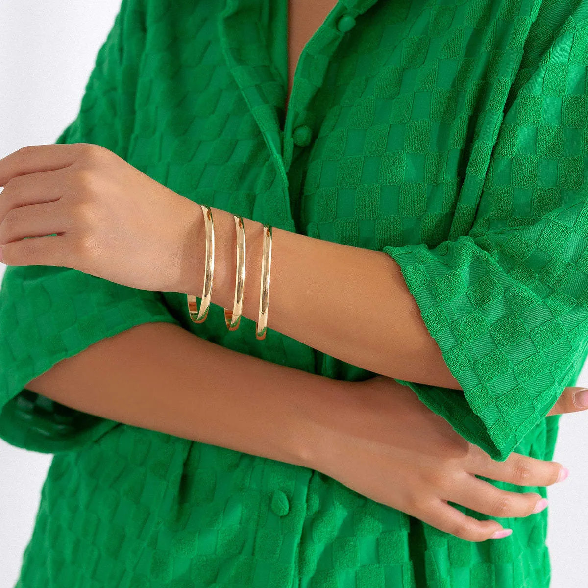 Goldtone Bangle - Set of Three sold by Zulily