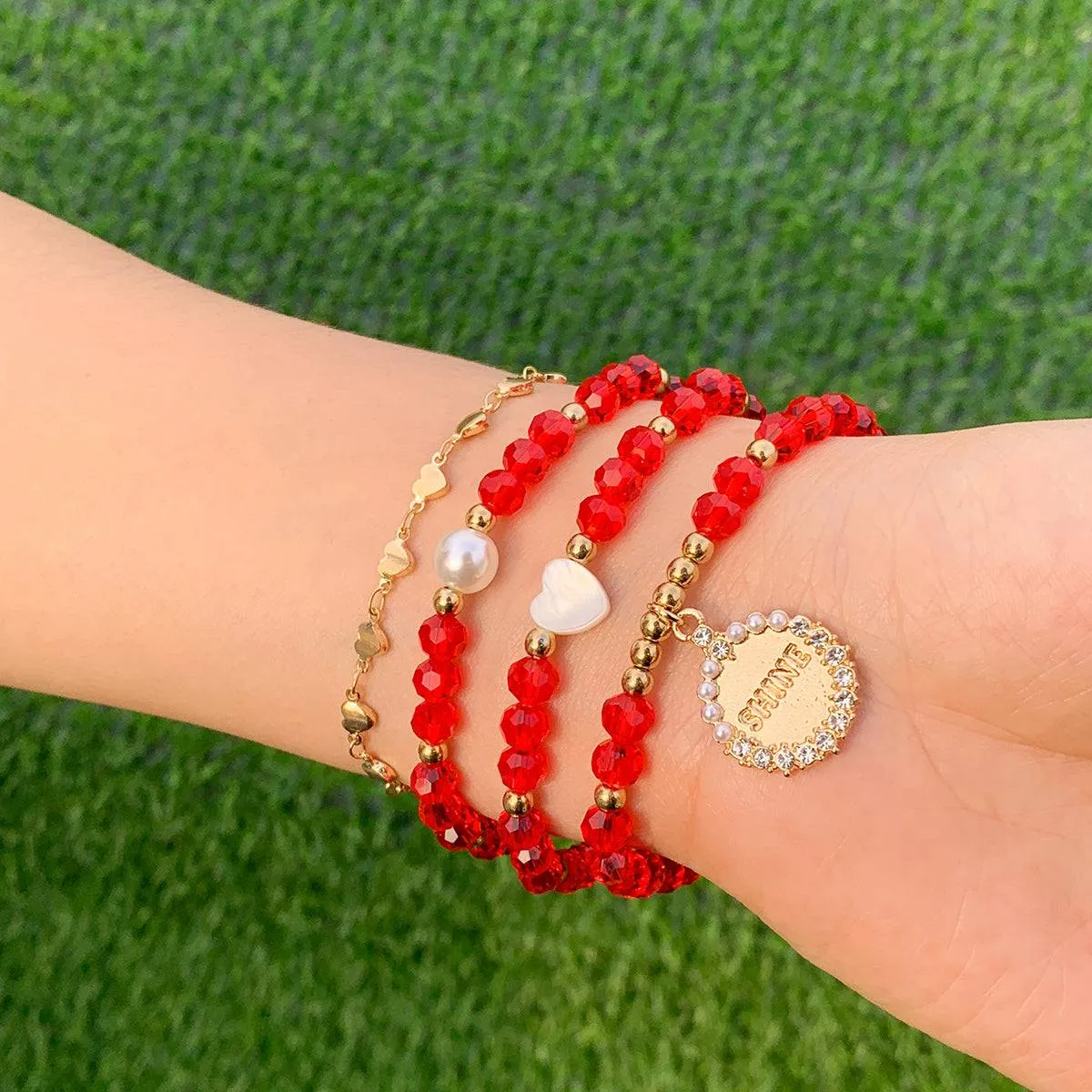 Red Crystal & Cubic Zirconia Pearl 'Shine' Charm Bracelet Set sold by Zulily