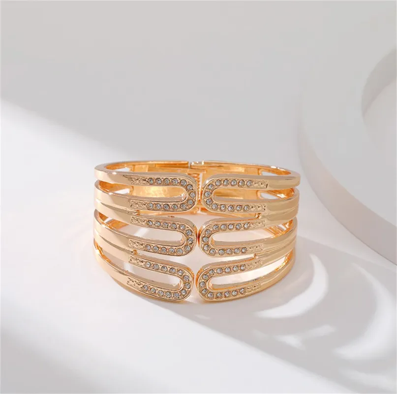 Cubic Zirconia & Goldtone Pin Layered Bangle made by Zulily