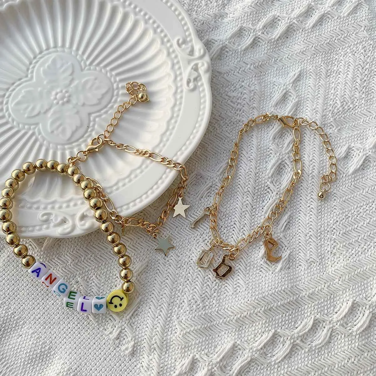 White Acrylic & Goldtone 'Love Angel' Beaded Stretch Bracelet Set sold by Zulily product image thumbnail 2