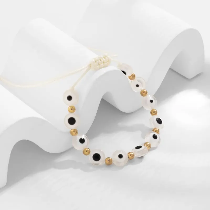 White Acrylic & Polyster Goldtone Eye Beaded Adjustable Bracelet made by Zulily