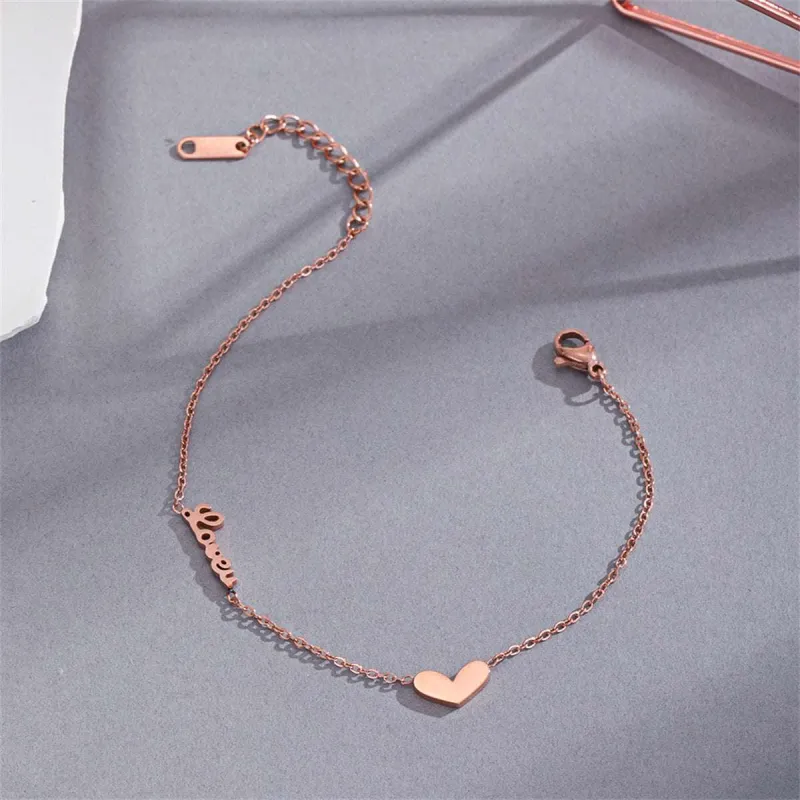 Rose Goldtone Heart 'Love' Bracelet made by Zulily