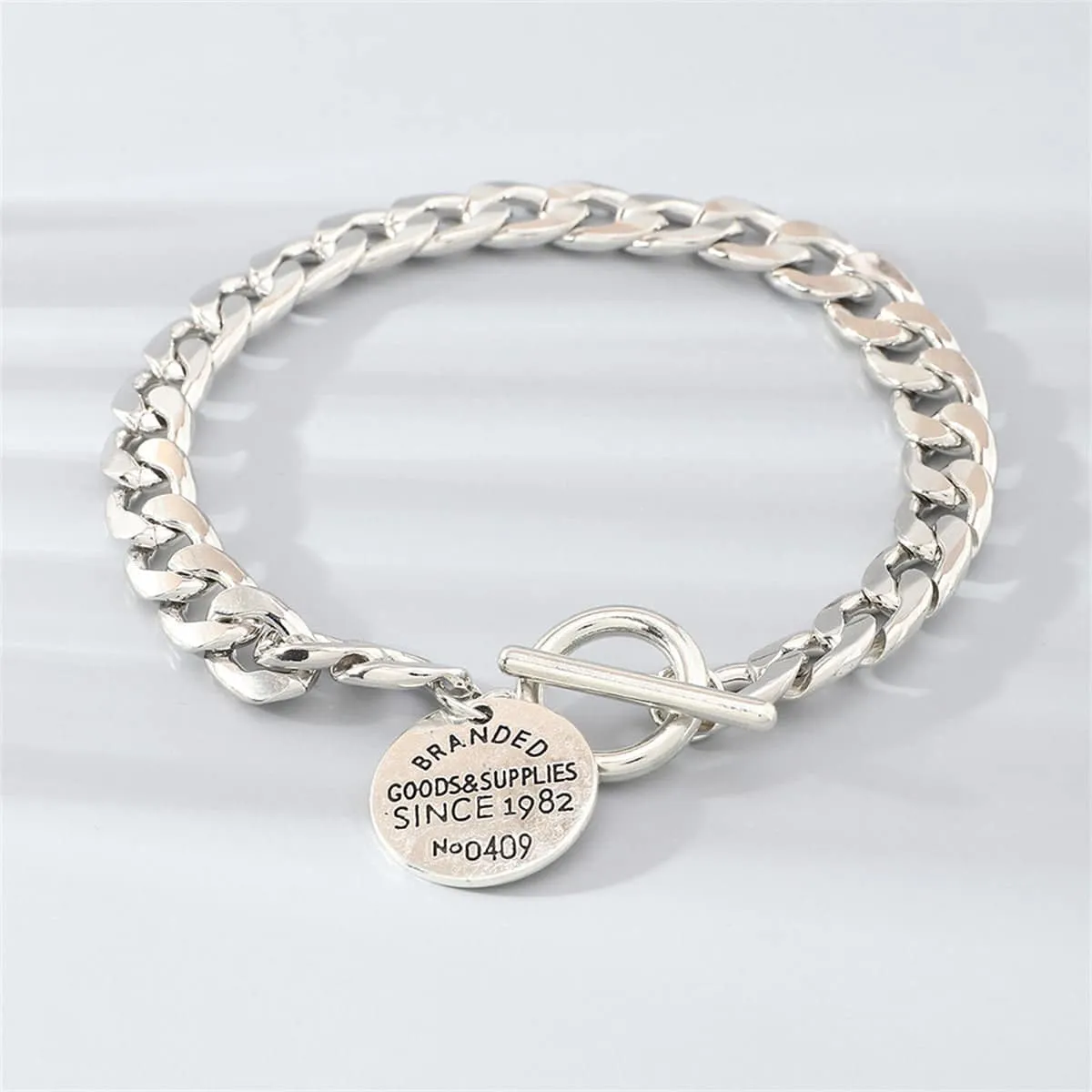 Silvertone 'Goods & Supplies' Curb Chain Toggle Bracelet sold by Zulily product image thumbnail 2