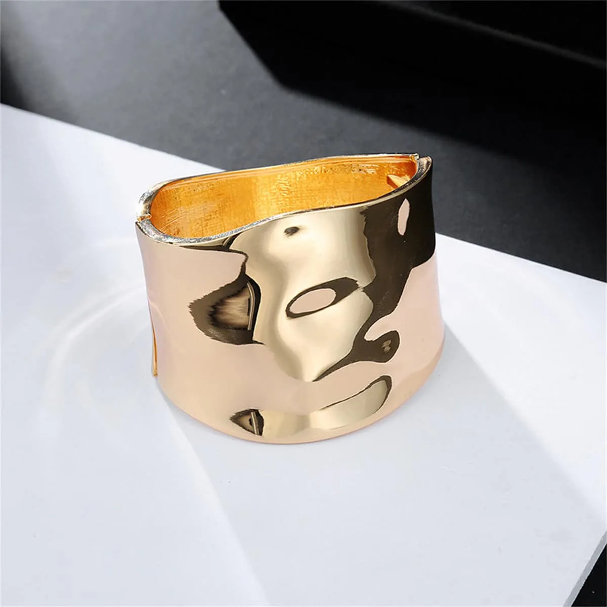 Goldtone Bright Curved Surface Bangle sold by Zulily product image thumbnail 2