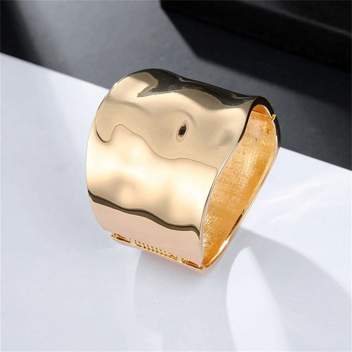 Goldtone Bright Curved Surface Bangle sold by Zulily product image thumbnail 3