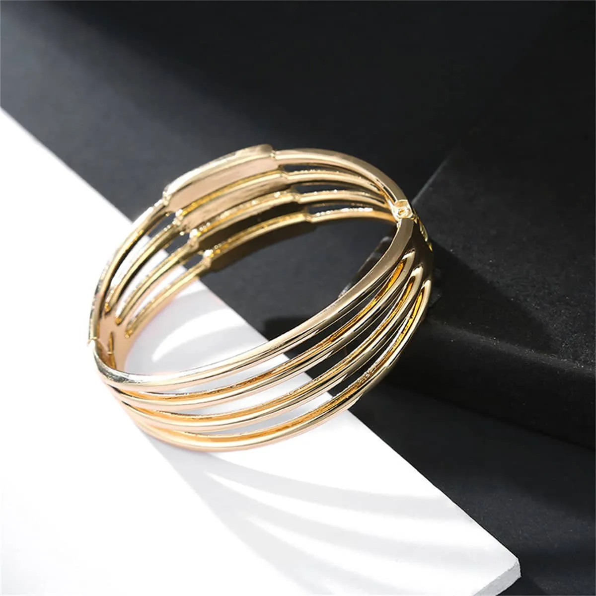 Goldtone Layered Bangle sold by Zulily product image thumbnail 3