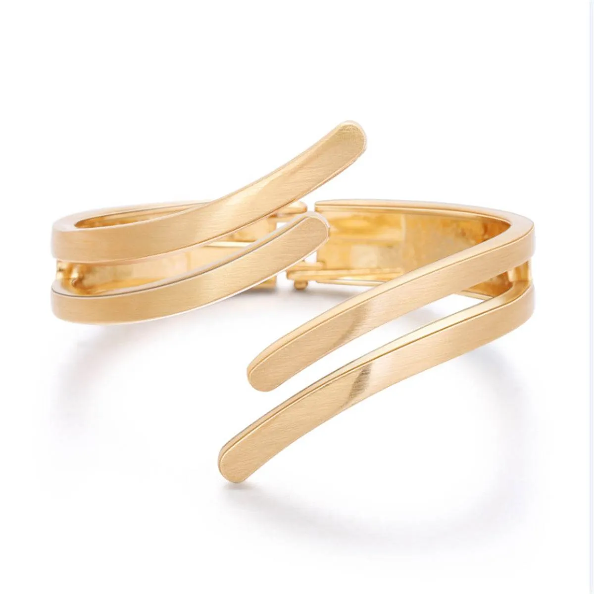 Goldtone Wing Open Bypass Coil Bracelet sold by Zulily