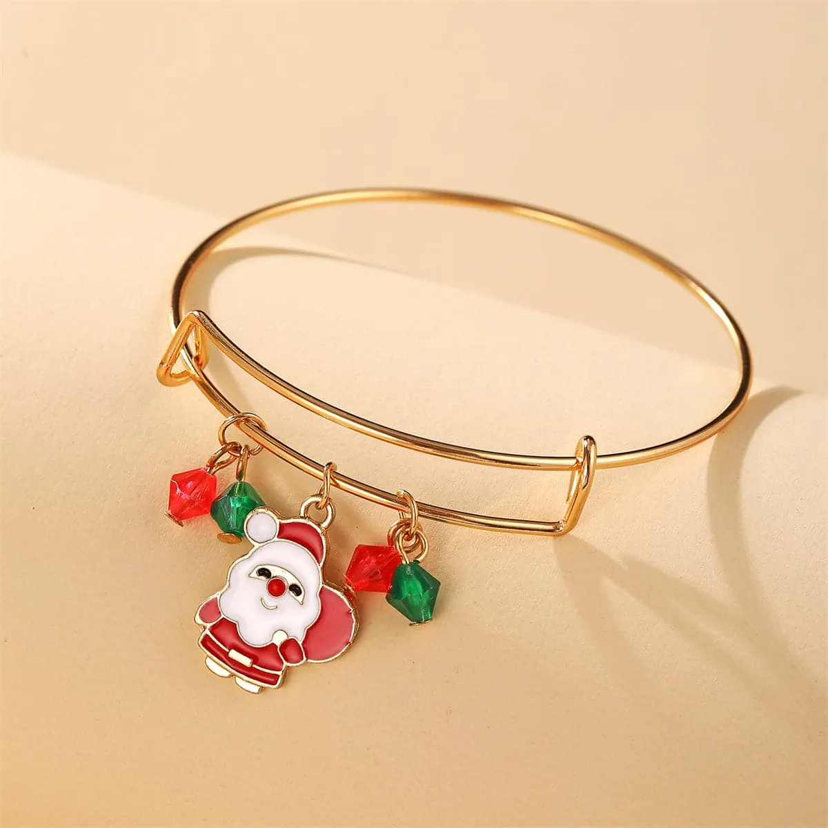 Green & Red Beaded Santa Adjustable Charm Bangle sold by Zulily