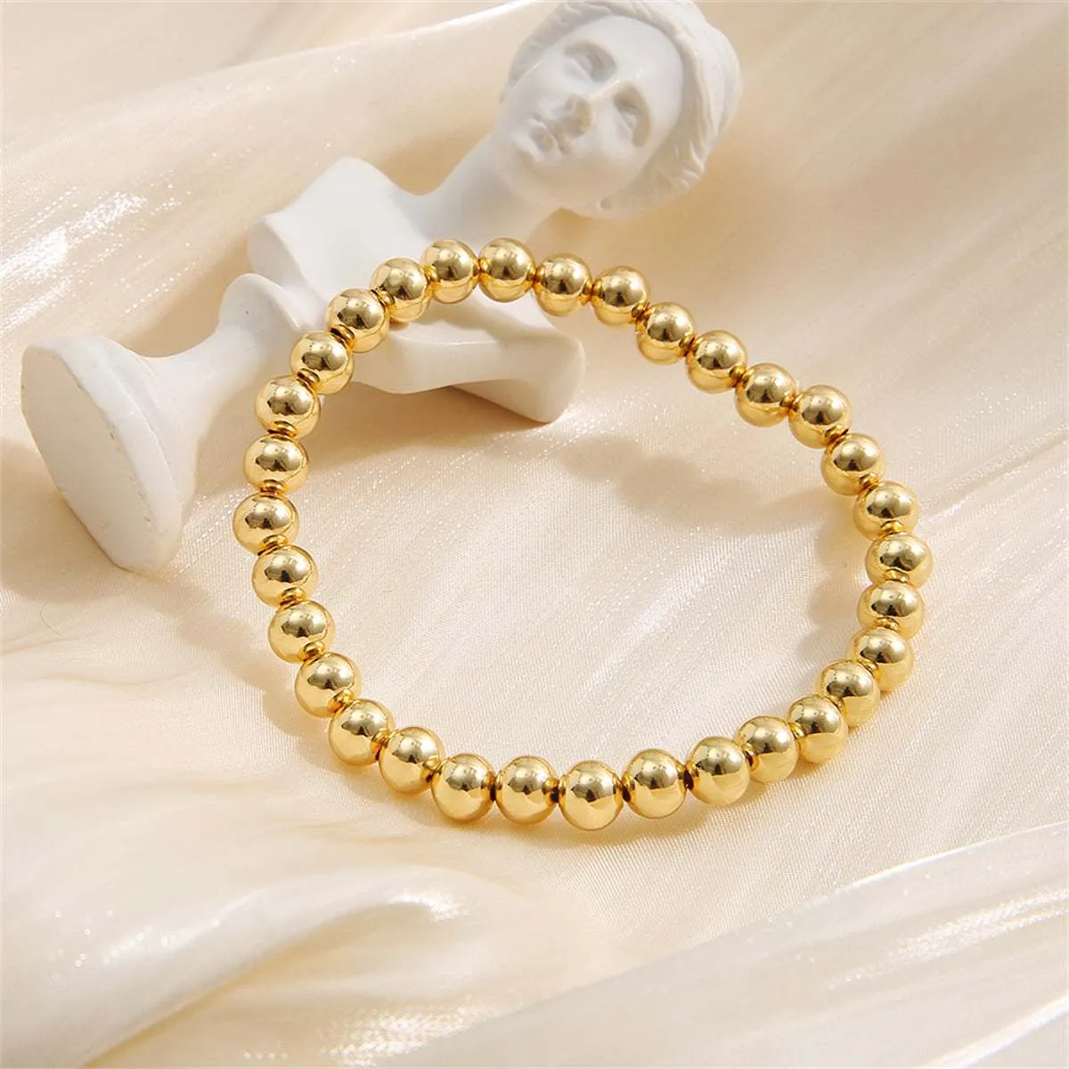 Goldtone Bead Stretch Bracelet sold by Zulily product image thumbnail 3