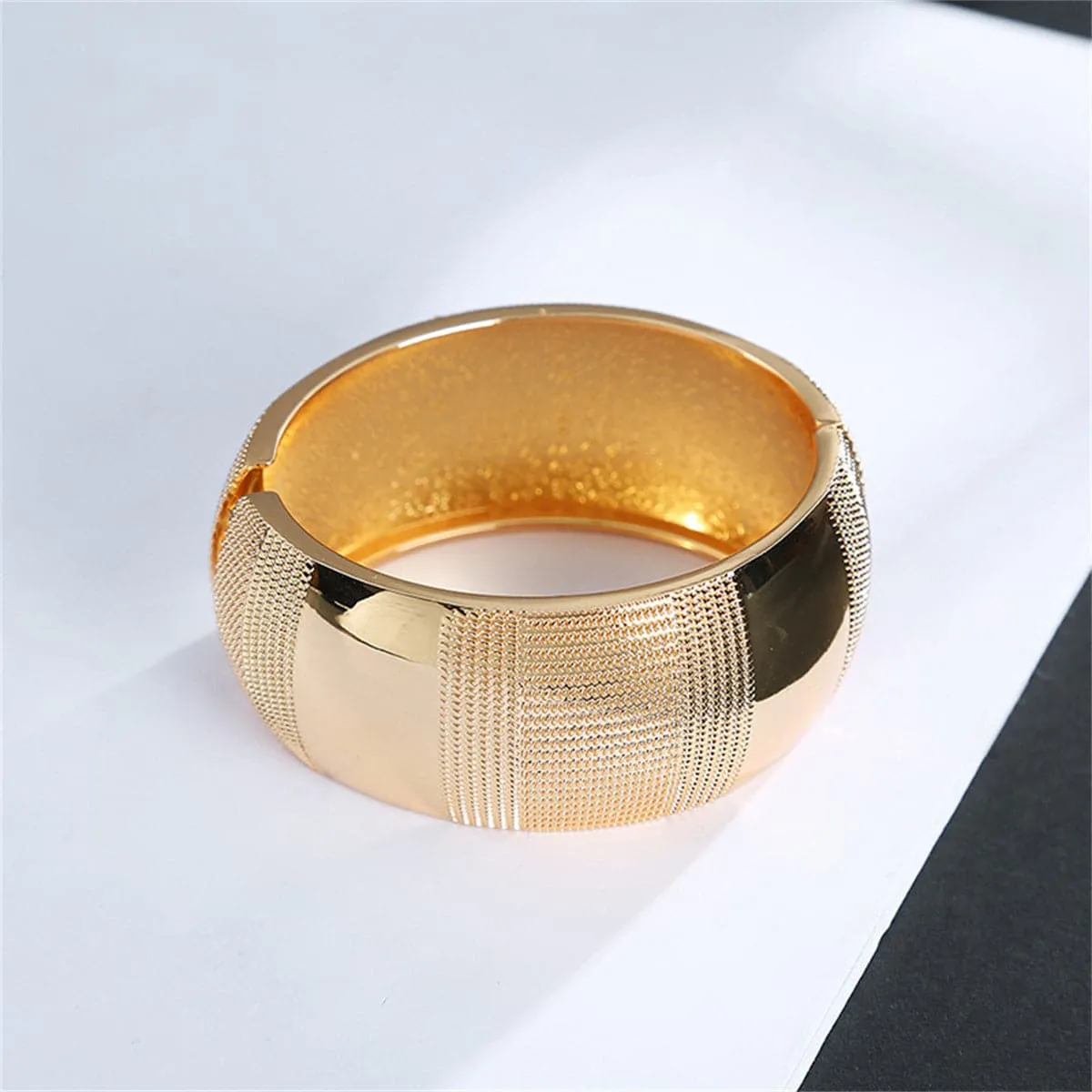 Goldtone Embossed Wavy Pattern Bangle sold by Zulily product image thumbnail 3