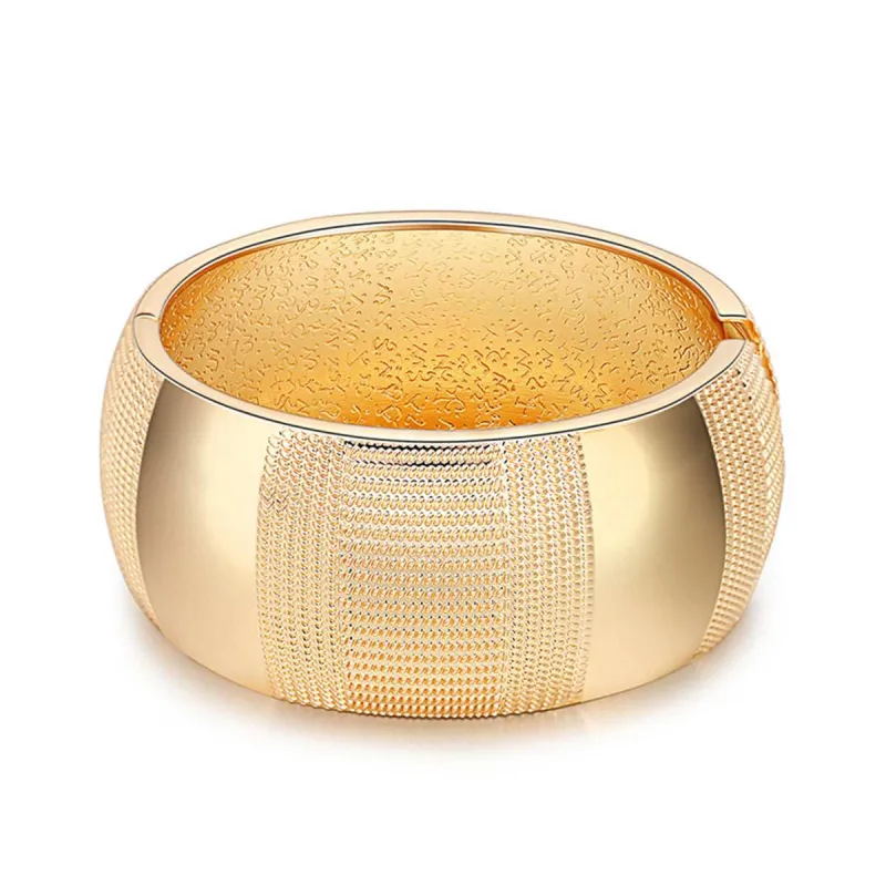 Goldtone Embossed Wavy Pattern Bangle made by Zulily