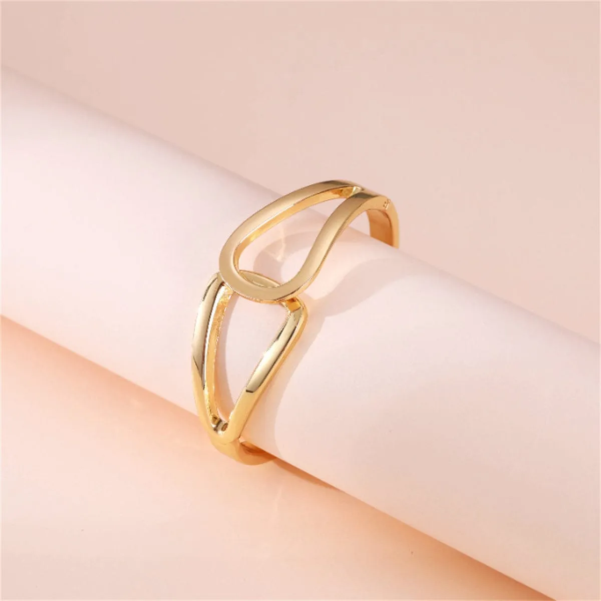 Goldtone Openwork Drop End Bangle sold by Zulily product image thumbnail 2