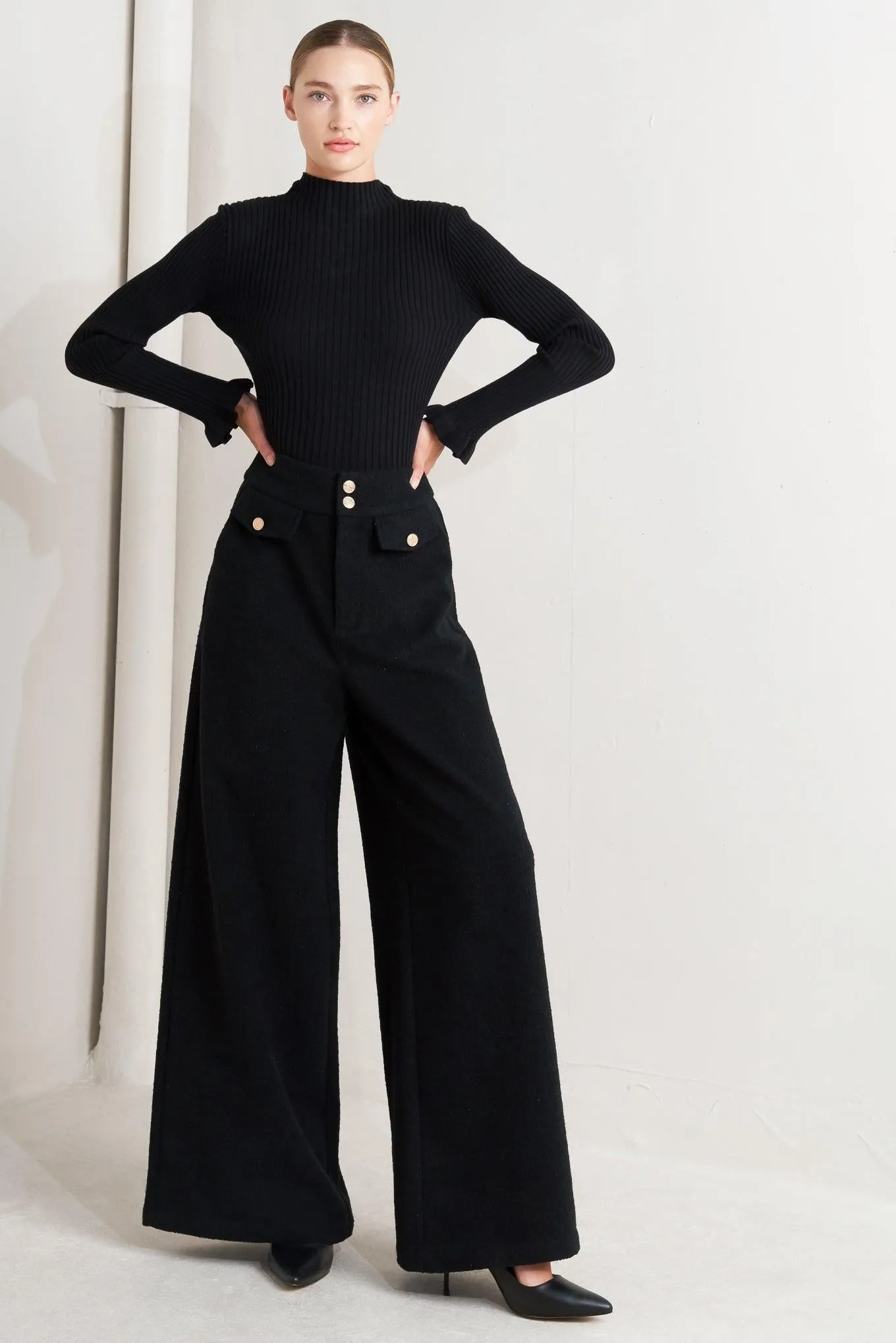 Prestige Volume Black Woven Pants sold by Zulily