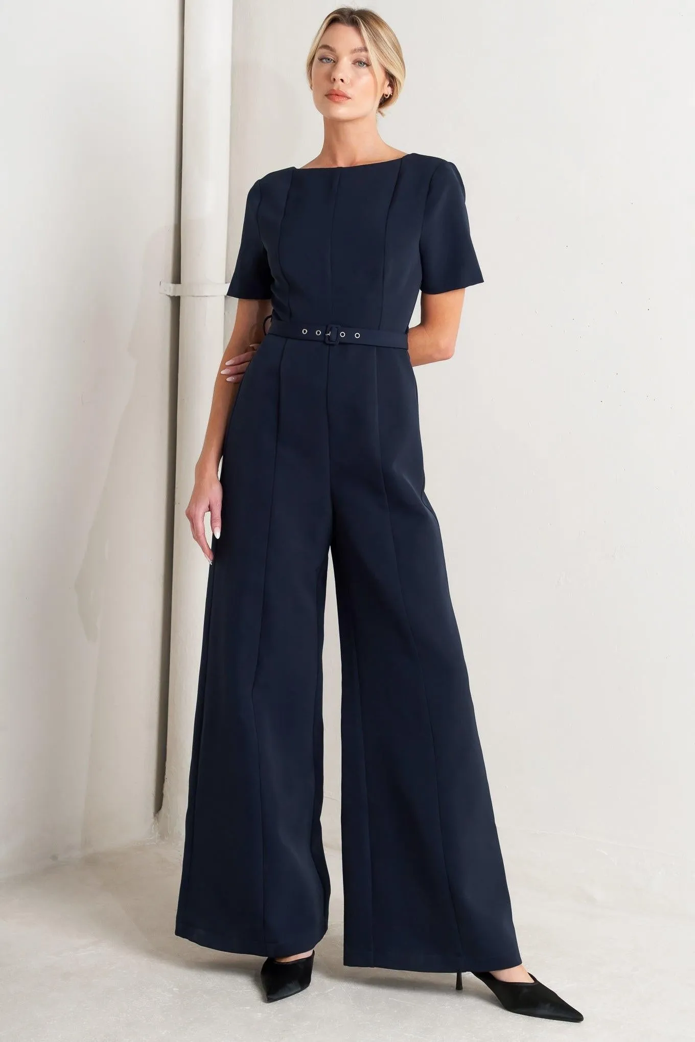 Forever Flattering Navy Woven Jumpsuit sold by Zulily