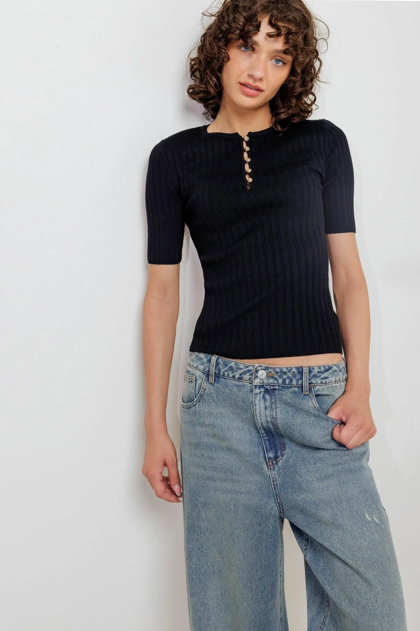 Modern Curl Sweater Knit Top sold by Zulily
