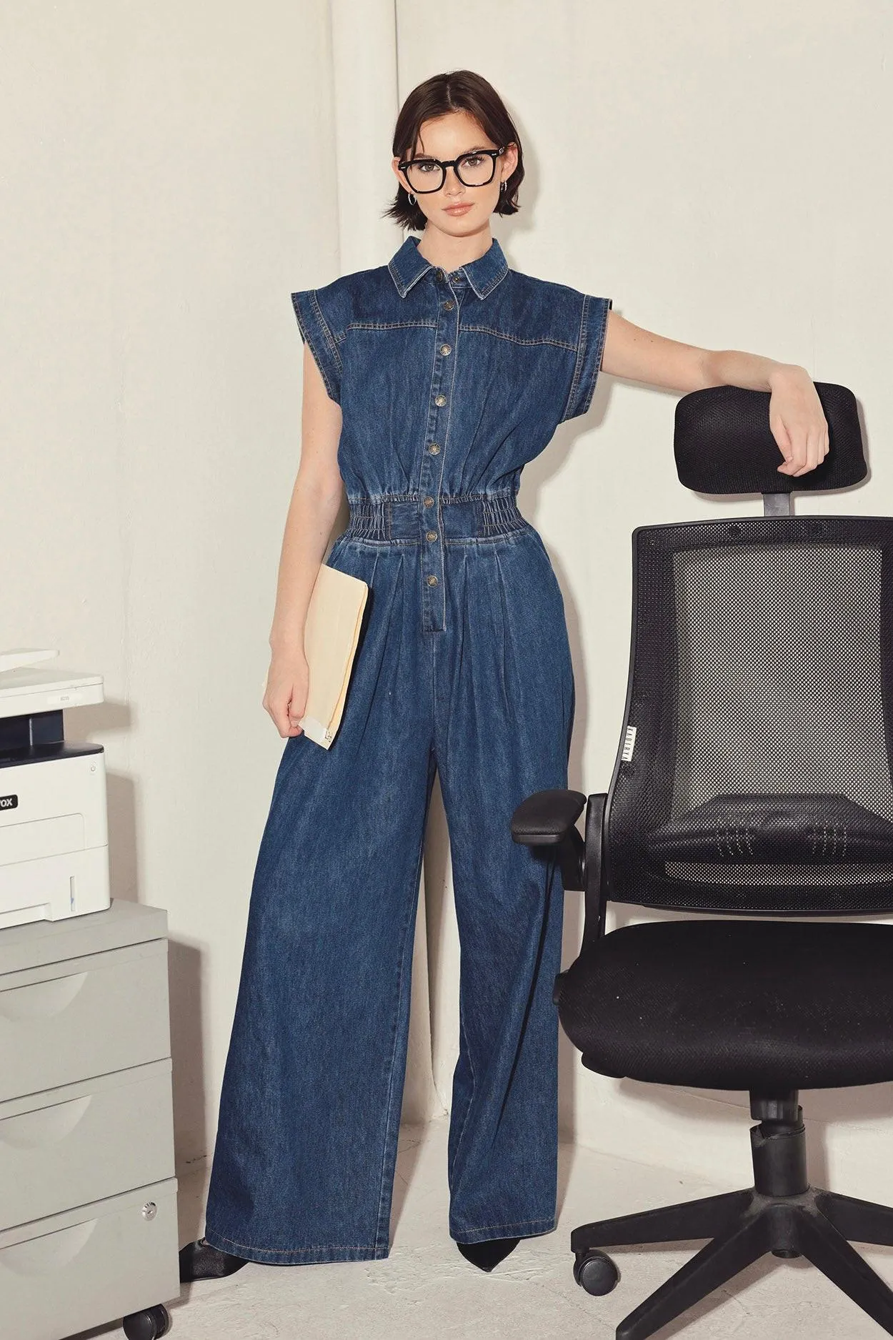 Power Play Denim Jumpsuit sold by Zulily