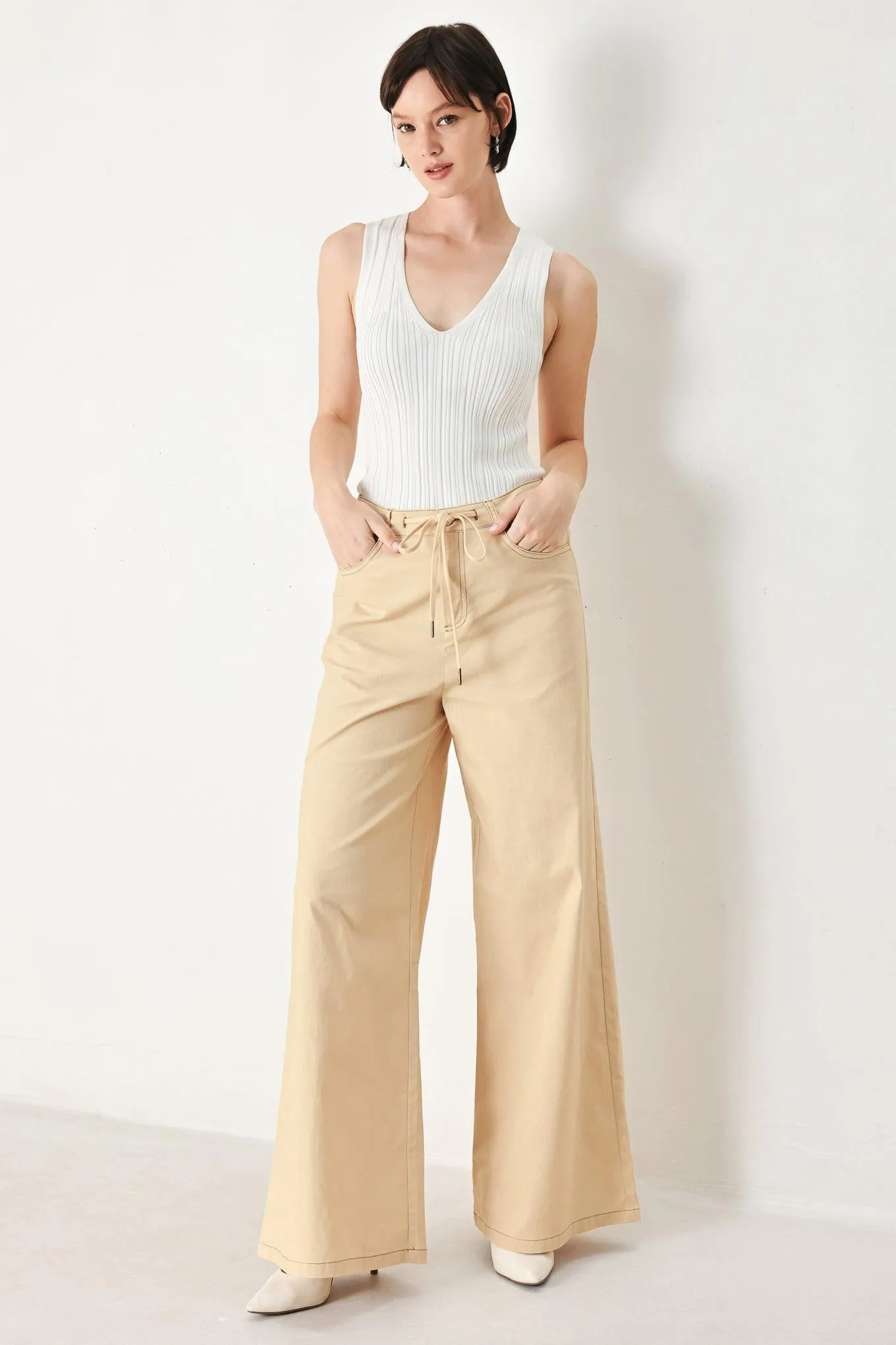 Modern Sand Woven Pants sold by Zulily