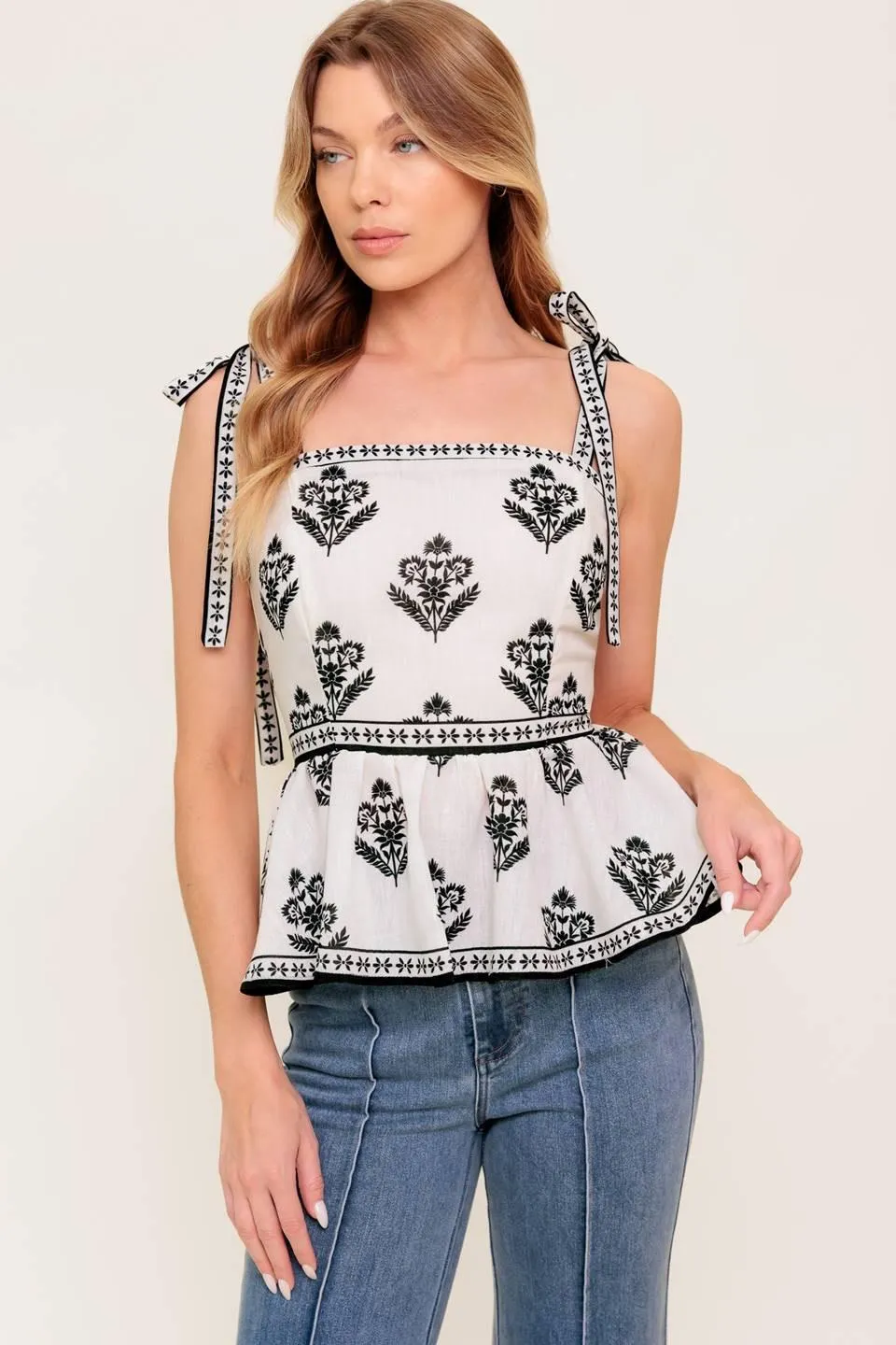 Serene Kiss Woven Top sold by Zulily